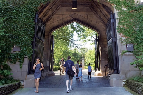 UChicago arch on campus with students walking